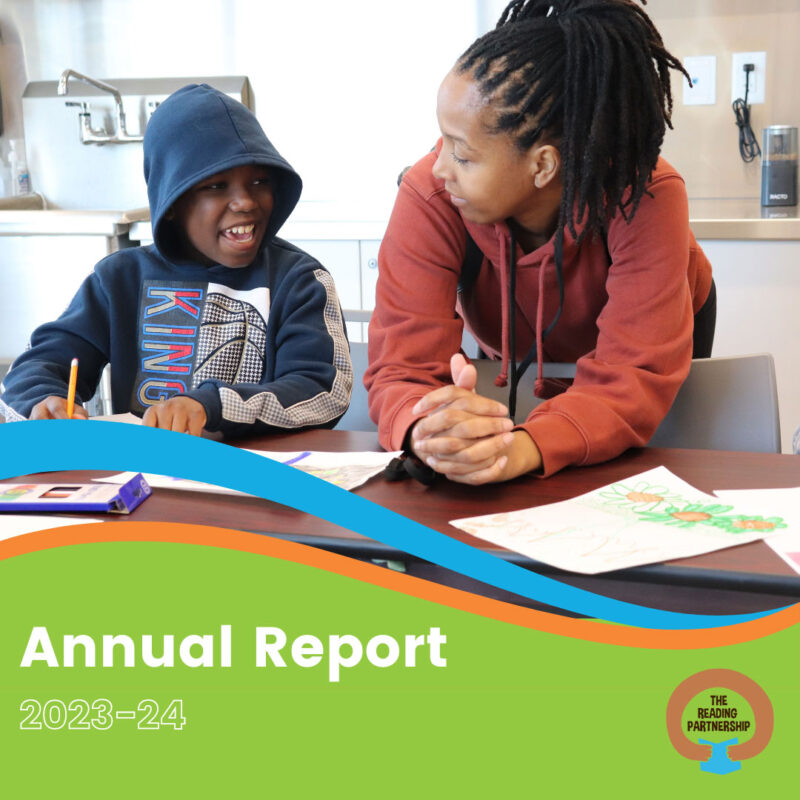 Front cover of the 2024 Annual Report. A photograph of a staff member engaging with a young boy sits above text that reads: Annual Report 2023-2024.